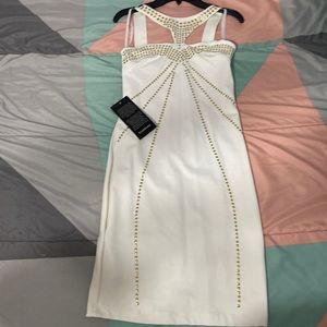 Brand New Bebe Bodycon White Knee length dress.